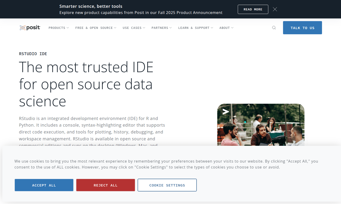 Close up of a person working on their laptop with RStudio Pro on the screen