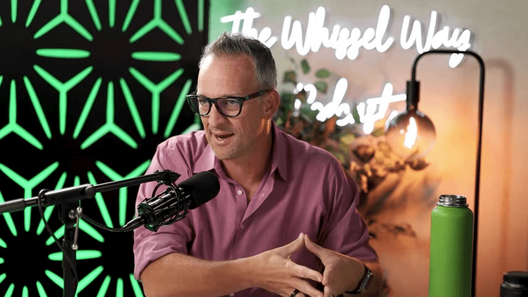 Modern real estate professional using AI tools on digital devices